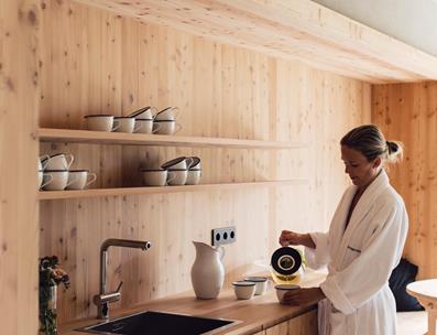 Woman prepares some tea