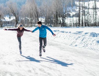 A couple is ice skating