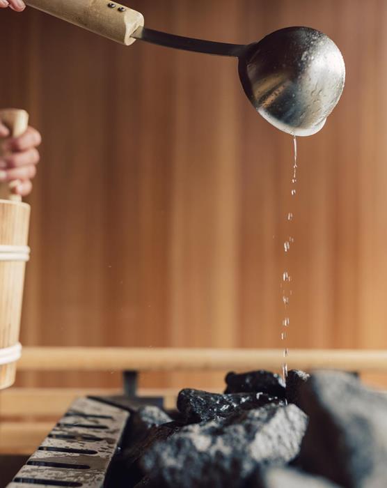 To sprinkle water on the hot stones of the sauna