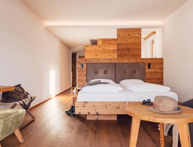 Family Suite with Pine Wood Furniture and Natural Larch Wood Floor